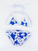 A blue and white bikini set with floral print.