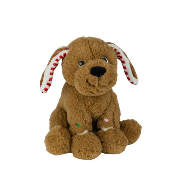 A brown stuffed dog with red and white ears.