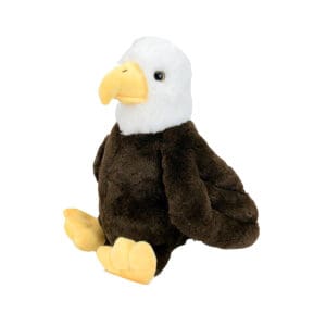 A stuffed eagle sitting on top of a white and brown bird.