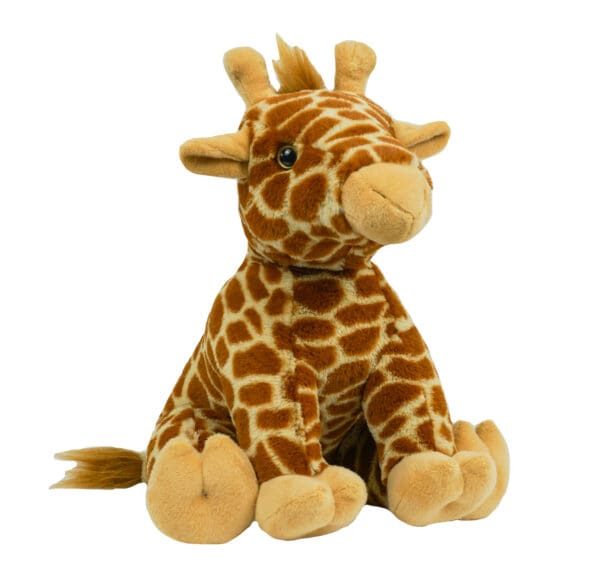 A stuffed giraffe sitting on top of a white table.