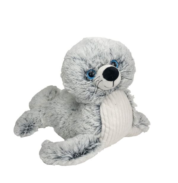 A stuffed animal that is laying down.