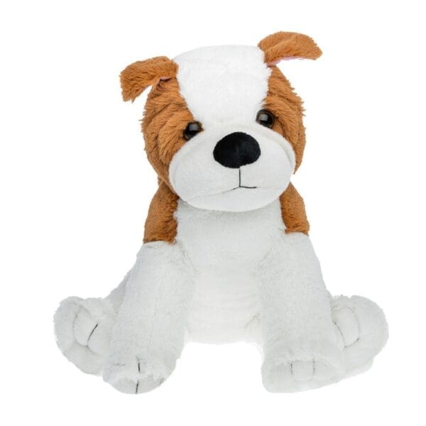 A brown and white stuffed dog sitting on top of a floor.