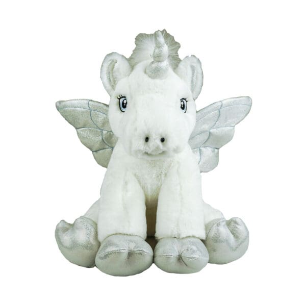 A white unicorn with silver wings sitting on top of it.