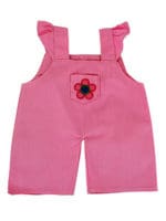 A pink overalls with a flower on the pocket.