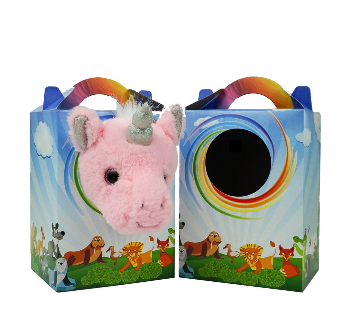 A pig in the middle of two bags with a rainbow on it.