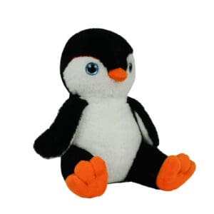 A stuffed penguin sitting on top of a white table.