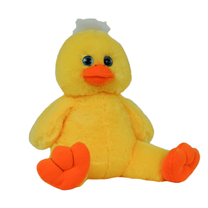 A stuffed duck sitting on top of a green background.