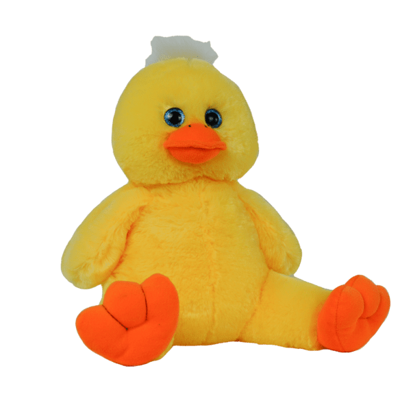 A stuffed duck sitting on top of a green background.