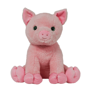 A pink stuffed pig sitting on top of a green background.