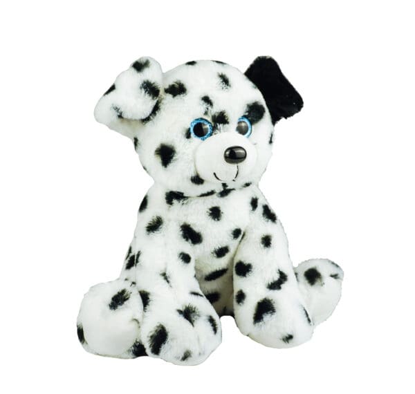 A stuffed animal dog with black spots on it's head.