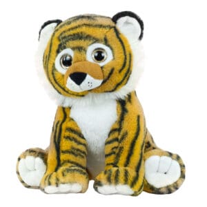 A stuffed tiger sitting on top of a white table.