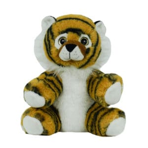 A stuffed tiger sitting on top of a white table.