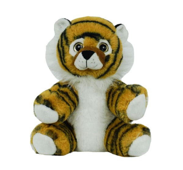 A stuffed tiger sitting on top of a white table.