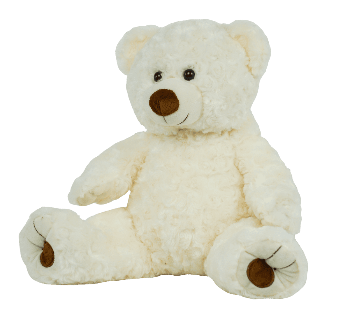 A white teddy bear sitting on top of a green background.