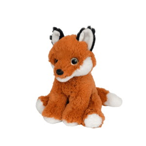 Cute plush fox toy on black background.